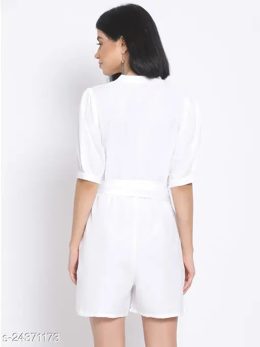White women's polyester playsuit by Oxolloxo, solid color design with mock collar, short puffed sleeves, and matching fabric belt. Basic yet chic for casual outfits