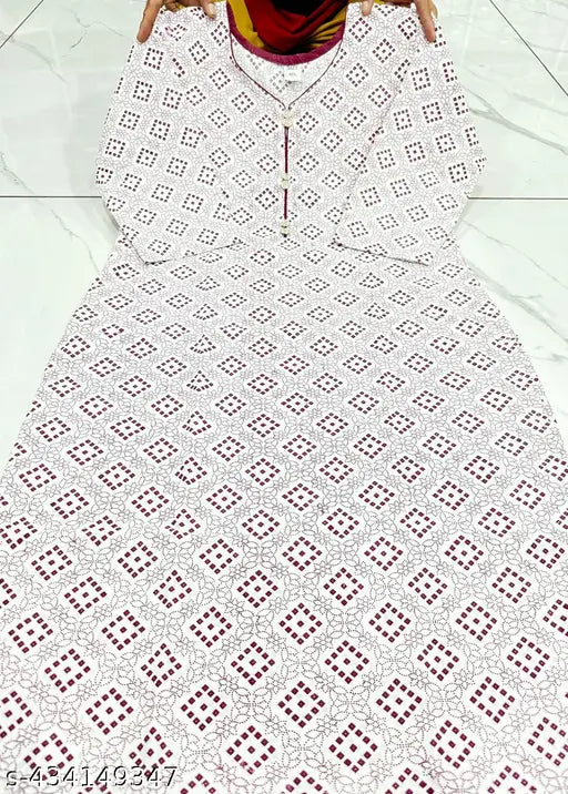 White cotton kurta set with black a-line pants, floral print and dupatta