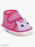 Pink shoe with cat design on a white background