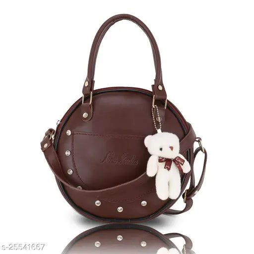 Brown leather slingbag with adjustable strap and silver studs
