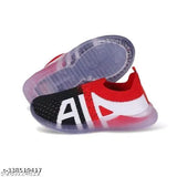 Child's red, white and black sneakers with LED lights on soles
