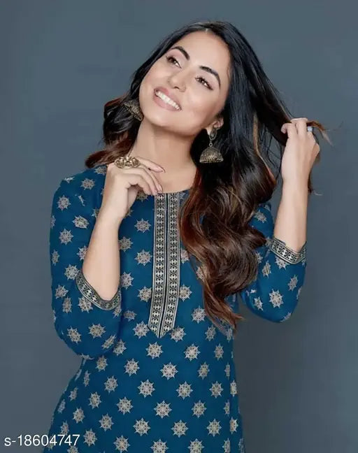 Rayon charvi sensational women's kurta set with palazzos, three-quarter sleeves, printed net design. Lightweight, trendy ethnic wear for women, perfect for weddings and occasions