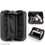 A black, zippered makeup bag with a clear plastic front pocket and multiple cosmetic applicators