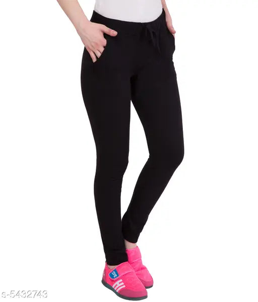 Black women's track pants with white stripe down side