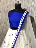 Versatile embroidered net lehenga in Banglory silk, semi-stitched with lace border. Up to 44in waist, 42in length