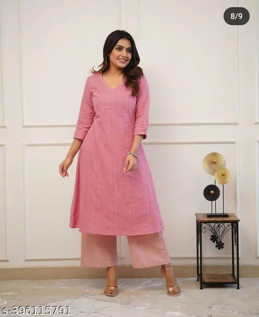 New pink katha cotton kurta set for summer use, three-quarter sleeves palazzos, solid pattern. Made in India
