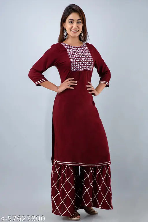 Red kurta set with embellished design, long kameez, straight hem