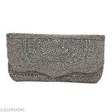 A beaded, textured, black clutch purse with a spacious compartment