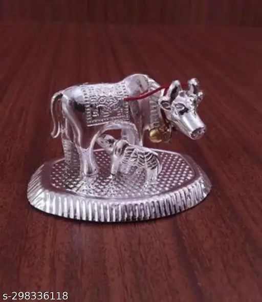 Silver brass Kamdhenu cow with calf statue, traditional Indian animal figurine