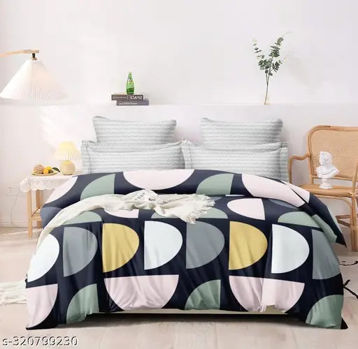 Half round bed sheet, blue, green, and cream geometric pattern. Soft cotton fabric.