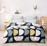 Half round bed sheet, blue, green, and cream geometric pattern. Soft cotton fabric.