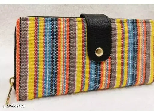 Multi-colored woven fabric clutch with zip closure and leather trim