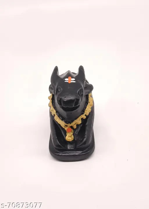 Handcrafted matt finish Nandi Idol, poly resin Shiva's cow statue for temple puja and home decor. #NandiIdol #ShivaCowStatue #HandcraftedIdol #TemplePuja #IndianArt #SpiritualDecor