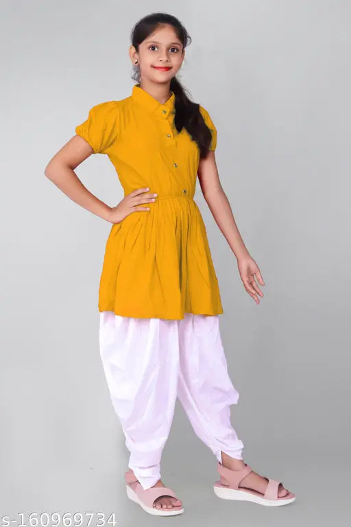 Yellow crepe fancy top & dhoti Kurta set for girls, solid pattern with short sleeves and A-line shape. Various sizes available from 4-5 to 15-16 years. Indian origin