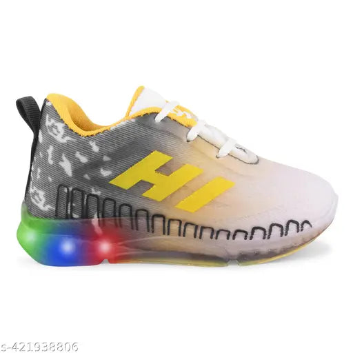 Black and yellow kids' LED sneakers with a rainbow light effect, featuring a prominent HI stripe design