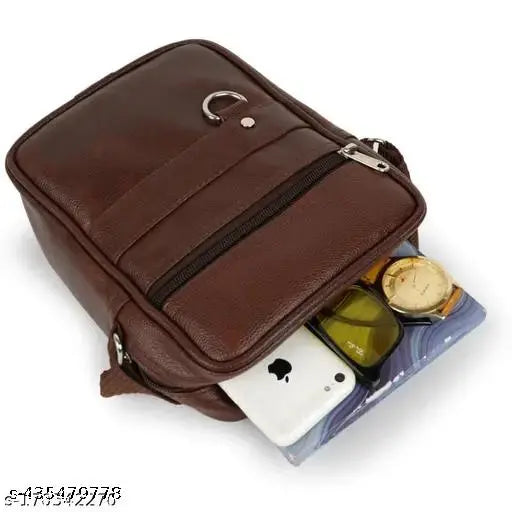 Leather travel bag with multiple compartments, including a phone pocket and coin holder