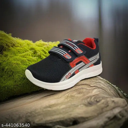 Blue and black casual sneakers with double velcro fastenings, designed for comfort and sporty style. Perfect for kids on the go, with a lightweight design for everyday wear or running