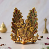 Multi-colored metal Radha Krishna idol statue with peacock diya design, ornamental home decor piece, 20cm tall
