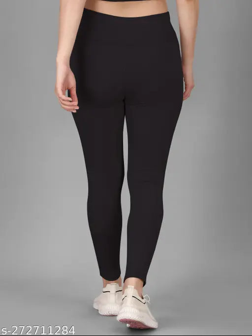 Black colorblocked tights for women's activewear, gymwear, and yoga. Polyester, solid net, high-quality comfort. Women's size 28/28in waist & 34in length, made in India