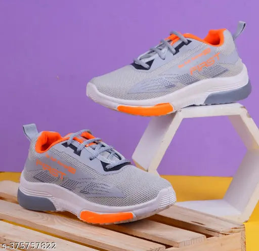 Kids grey running shoes, synthetic sole, textured net, lace-up. Ideal for boys. One pair, sizes: 4-5yrs, 5-6yrs, 6-7yrs, 7-8yrs, 8-9yrs, 9-10yrs, 10-11yrs, 11-12yrs. Made in India