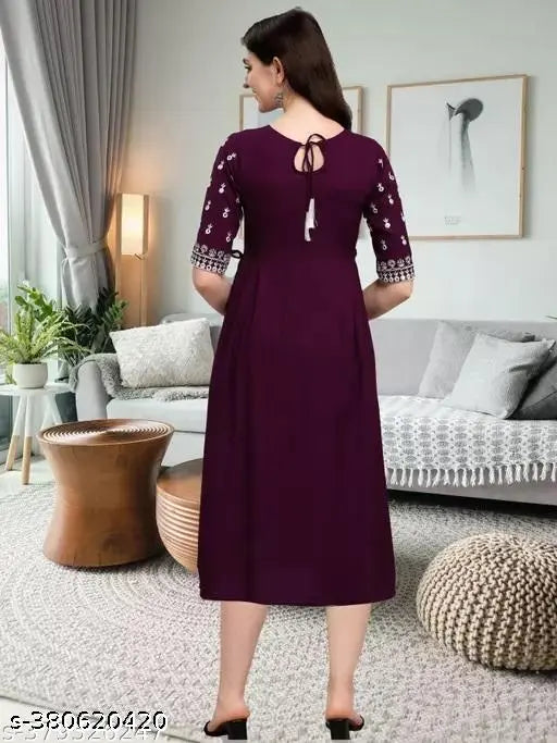 Purple sleeveless dress with V-neck, backless design, available in sizes XS - 3XL
