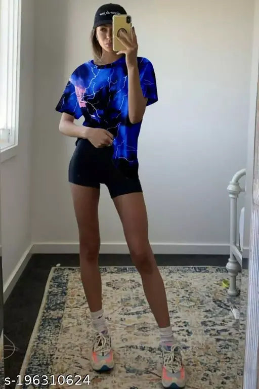 Oversized t-shirt, distressed blue fabric with a graphic design