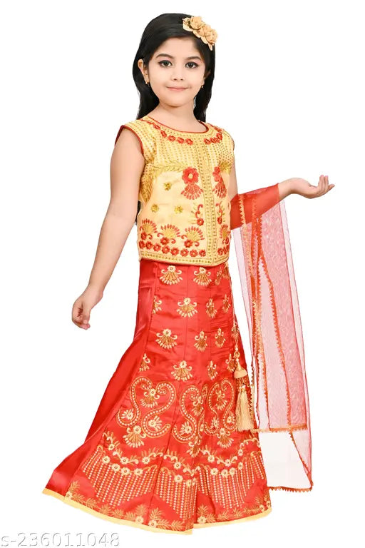 Girl's red lehenga choli, embroidered silk, gold accents, ruffled skirt, tulle dupatta.
