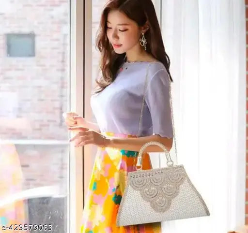 Stylish sling handbag, white fabric with embroidery
