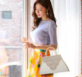 Stylish sling handbag, white fabric with embroidery