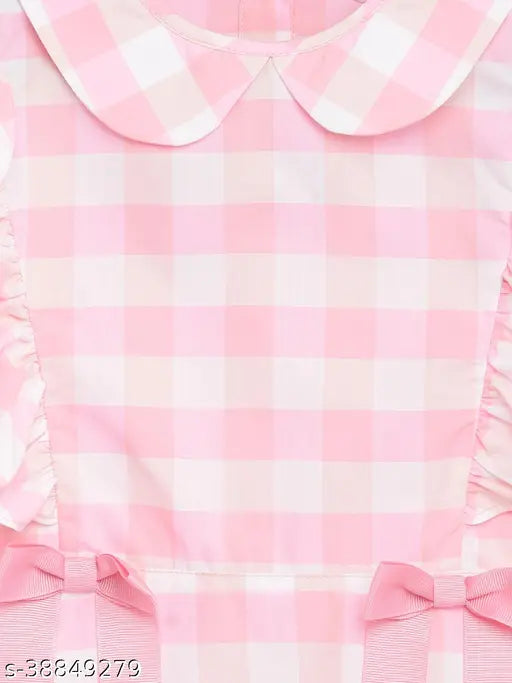 Pink and white plaid cotton dress with ruffled neckline and attached waist bow