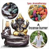 A decorative, handicrafted polyresin backflow Lord Ganesha incense holder with a meditative "Mahadev Dhyana Mudra" figurine and 10 cones for car dashboard. Golden color, 3D effect