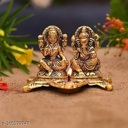 Metal Lakshmi Ganesh statue with golden coin, traditional Indian Ganesha idol for puja and diya