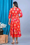 Red rayon Anarkali kurti with gold print, three-quarter sleeves, vibrant Indian fashion