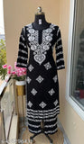 Rayon Chikankari embroidered women's kurta set with bottom, three-quarter sleeves, featuring intricate net patterns. Indian craftsmanship." (124 characters)