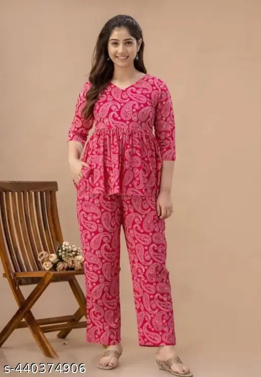 Pink premium rayon women's co-ord set (rayon top & cotton blend pants), three-quarter sleeves, trendy Indian print