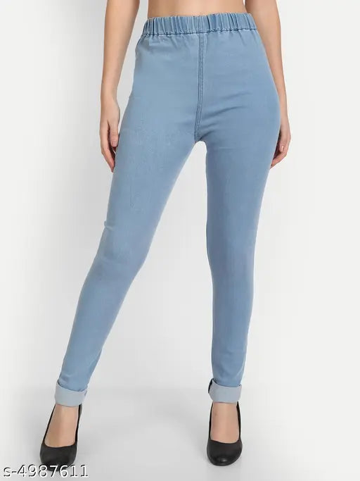 Skyblue denim skinny jeggings for women, medium waist, stretchable fabric on model