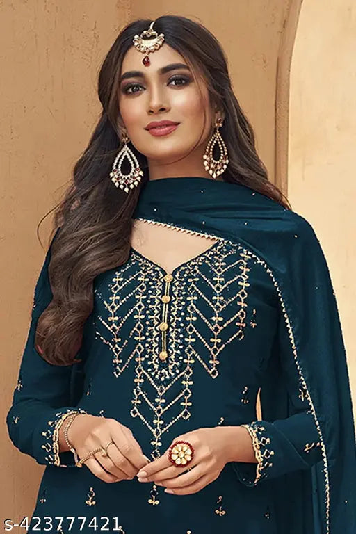 Deep blue embroidered suit with dupatta, embellished with intricate patterns