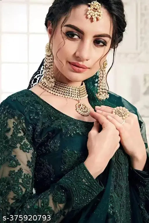 Embroidered net lahenga choli and dupatta set, semi-stitched Indian bridal wear" (108 characters)
