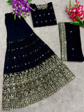Gold beaded evening dress with matching shawl and clutch, featuring sheer mesh panels and intricate beadwork