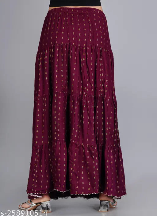 The image shows a long, solid purple skirt with printed details, designed for women