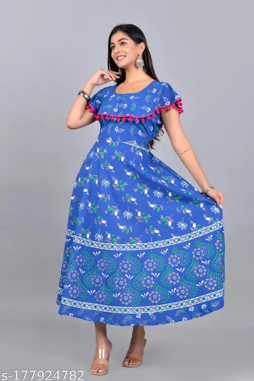 Women's Jaipuri cotton printed kurti, vibrant color and intricate print, free size up to 44 inches (XXL), round neck with attached short sleeves, pom pom detailing, made in India