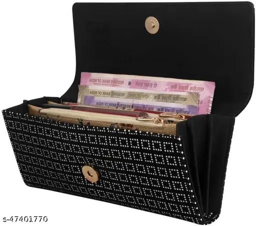 Black polka dot patterned handclutch, with zip closure and multiple card slots