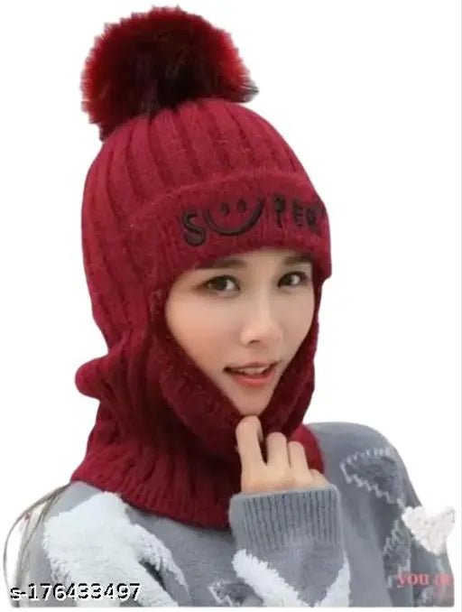 Fashionable red soft wool cap with fuzzy ball trim
