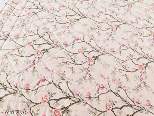 Cotton blend double bed quilted comforter, printed AC design - India