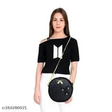 Black faux leather purse with silver hardware, gold chain strap
