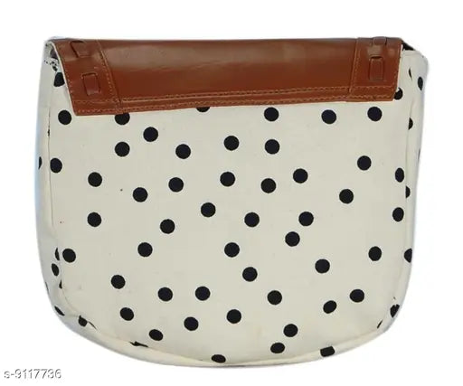 Women's slingbag with polka dot pattern, brown trim