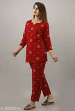 Red printed rayon women's night suit set with three-quarter sleeves, perfect for comfortable loungewear