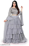 Silk blend and net embroidered lehenga with ruffle design and heavy embellishments, Kalamkari dupatta on display