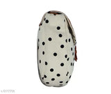 Women's slingbag with a polka dot pattern, black fabric, featuring a shoulder strap and side pockets