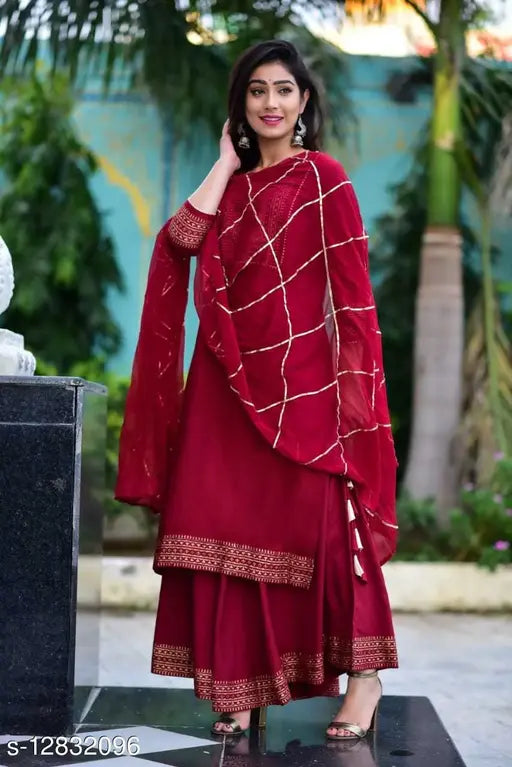 Red and beige geometric pattern kurta set with sharara, suitable for parties